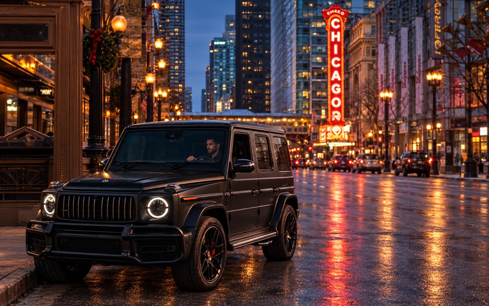 A black Mercedes-AMG G63 on State Street at dusk, the Chicago Theatre sign behind